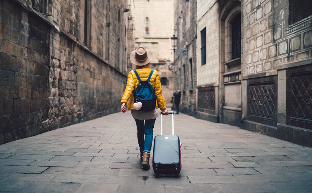Girl-Pulling-Suitcase